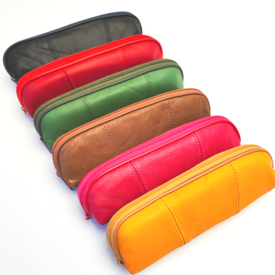 Pack colorido de fundas de piel nacional con cremallera horizontal